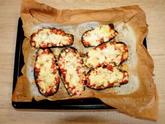 Eggplants in the oven with pizza filling - Photo By Thanasis Bounas