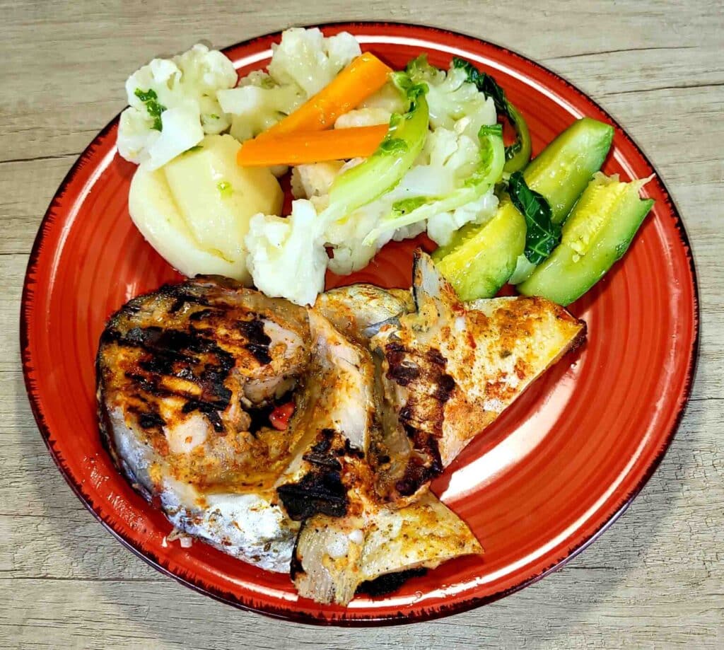 Grilled salmon with boiled vegetables - Photo By Thanasis Bounas