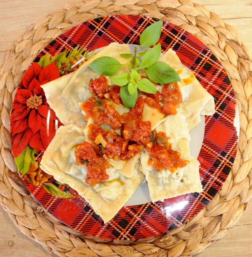 Ravioli with spinach and tomato and basil sauce - Photo By Thanasis Bounas