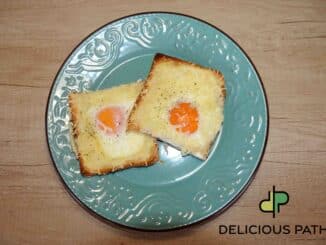 Sunny-Side-Up Eggs with Cheese on Toast in the Oven - Photo By Thanasis Bounas